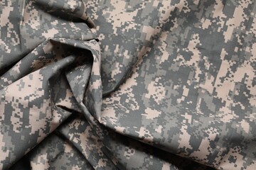 Poster - Texture of crumpled camouflage fabric as background, top view