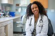 Photo of young woman doctor smiling for the camera. Job, profession, heathcare