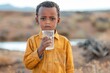An African-American child holds a glass of water. The concept of water scarcity generated AI
