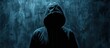 A mysterious hacker man in the hoodie in front of dark concrete background. Generated AI