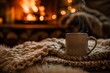 Warm and inviting image of a steaming mug wrapped in a knitted blanket with a roaring fireplace in the background