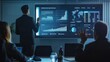 © wpw - A CEO businessman presents information to a group of investors and business people during a business meeting. A projector screen displays graphs related to product sales, revenue growth strategy