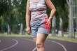 © staras - Pain in the hip during training, muscles cramped, massage on a sports ground after workout