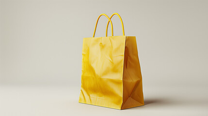 Wall Mural - Yellow Folded paper bag with handle isolated on white background. Paper bag. Kraft paper shopping bag. Yellow folded paper bag with handle. Empty grocery paper bag. Recycled carton package.