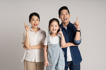 Wall Mural - Asian family portrait posing on white background