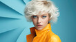 © lensofcolors - Fashion horizontal image of stylish female model with modern blonde haircut dressed in yellow with blue backdrop and copy space. Fashion and glamorous style. AI generated