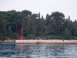 Deserted pier in the port. Small ripples on the surface of the sea. Rovinj, Croatia - February 29, 2024