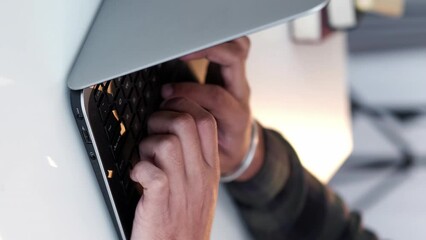 Vertical keyboard typing remote man hands laptop