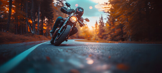 Wall Mural - Motorcyclist riding on the road. A motorcycle rider speeding on a road. Adventure and travel concept.