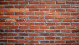 Fototapeta Sypialnia - Close up view of a red brick wall. Texture of old dark brown and red brick wall panoramic background. Minimal pattern background concept. Trendy brick wall background idea. Copy space.