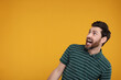 © New Africa - Portrait of surprised man on yellow background, space for text