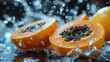  a couple of pieces of papaya sitting on top of a metal surface with water splashing around it and a few pieces of papaya on top of papaya.