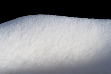 Wall Mural - white snow in daylight, background, isolate on black background