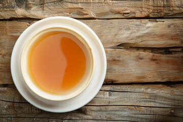 Sticker - Caramel custard on plate with wooden background