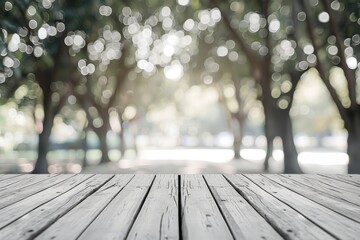 Sticker - Blank white wooden background with blurred trees and bokeh perfect for product display montage