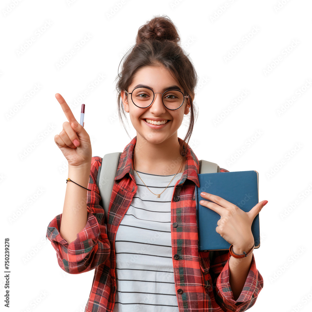 Smiling young female student holding a book and pointing at something ...