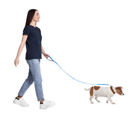 Wall Mural - Smiling woman walking with dog on white background