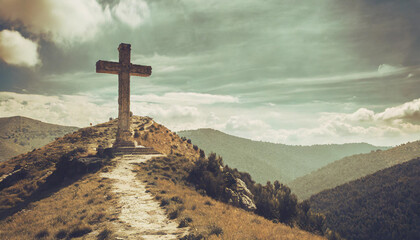 Cross on a hill, old, battered, ancient, crumbling