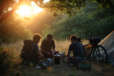 Fototapeta  - bikers seated around a campfire, studying a map in the fading natural light of dusk