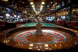 Fototapeta  - An elegant and detailed shot of a roulette wheel at a casino, showcasing the game's sophistication