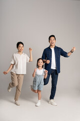 Wall Mural - Asian family portrait posing on white background