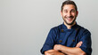 An image capturing the joyous expression of a male chef as he dons his professional blue uniform against a blank, white canvas