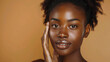 African model shows off smooth, radiant, beautiful skin for her age. Facial skin care concept.