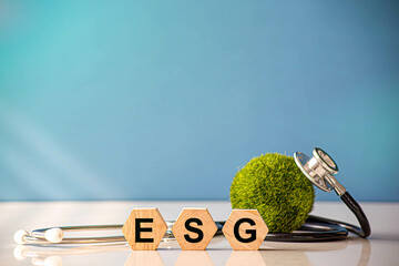 ESG concept of environmental, social and governance.words ESG on a woodblock