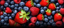 Vibrant Fresh Berries And Blueberries Arranged In A Colorful Panoramic Display For Summer Delight