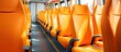 Vivid Orange Bus Seats Lined Up in Perspective View Illustrating Comfort and Travel