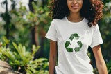 Fototapeta Kuchnia - woman wearing white t-shirt with recycling sign 