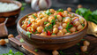 © Ammad - White chickpeas chat in the wooden bowl for muslim fasting