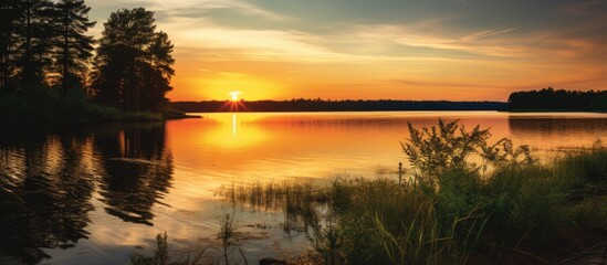 Wall Mural - Tranquil Serenity: Mesmerizing Sunset Reflections in a Calm Lake Setting