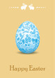 Easter egg with blue floral pattern. Happy Easter. Beige vector greeting card