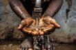 A close-up image capturing water splashing as it is caught in the cupped hands of an individual, symbolizing life and purity