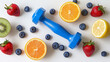 Healthy food concept with blue dumbbell with clean fruit