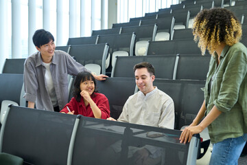 Poster - Group of multinational students having a conversation in the classroom