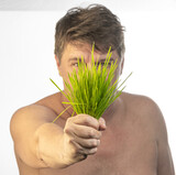 Fototapeta Mapy - man holding a plant