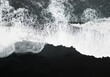  aerial top view over ocean waves crashing on Iceland Solheimasandur black sand beach. copy space banner