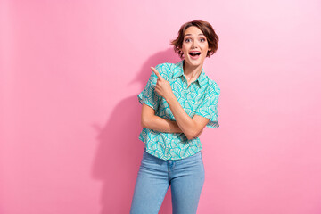 Poster - Portrait of stunned attractive lady direct empty space ad sale poster wear casual shirt denim pants isolated pink color background