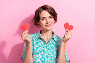 Poster - Photo of lovely friendly person hands hold small red paper heart symbol cards isolated on pink color background