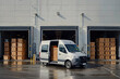 © ADDICTIVE STOCK - Delivery van loading at a warehouse docking station. Generative AI image
