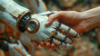 Friendly handshake between robot and human.