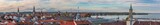 Fototapeta  - Huge panoramic view over the city Constance (Konstanz) by Lake Constance (Bodensee). The Imperia statue, the towers of church St. Stephan, Constance Cathedral and the train station can be seen.