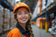 © Aris - Caucasian woman wearing delivery officer uniform in the sorting warehouse