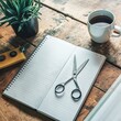 high angle view notebook scissors