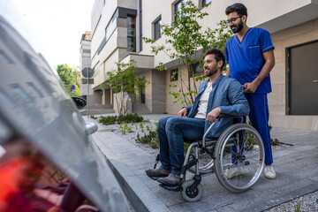 Dark-haired man on a wheelchair opening a car door