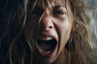 © Firn - Face of woman screaming in frustration