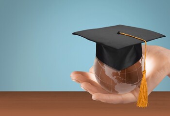 Canvas Print - Graduation cap on Earth globe. study concept