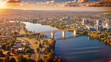 Wall Mural - Aerial view of the city of Perth, Western Australia. Aerial drone panoramic view looking at Victoria Bridge over the Waikato River as it cuts through the city of Hamilton, AI Generated